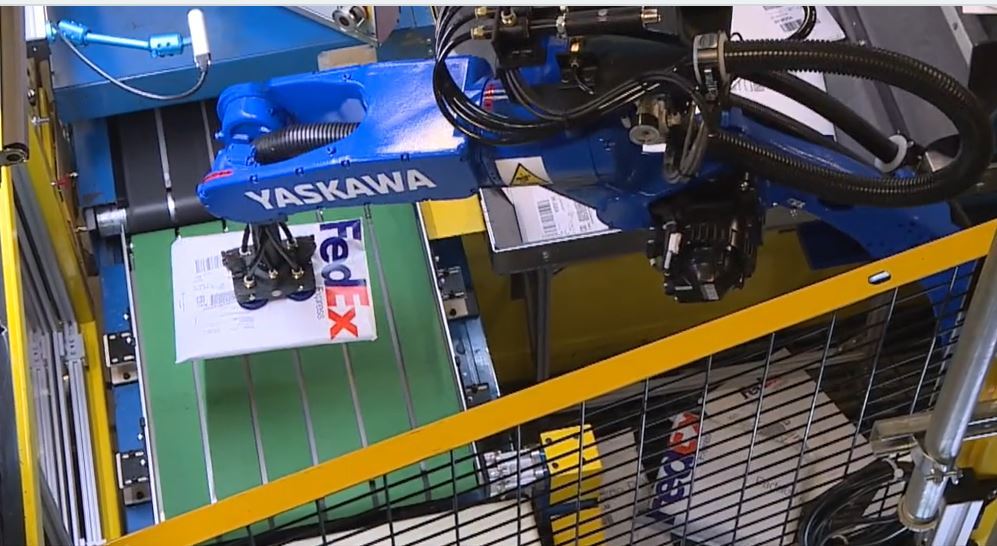FedEx is utilizing robotic arms to sort packages